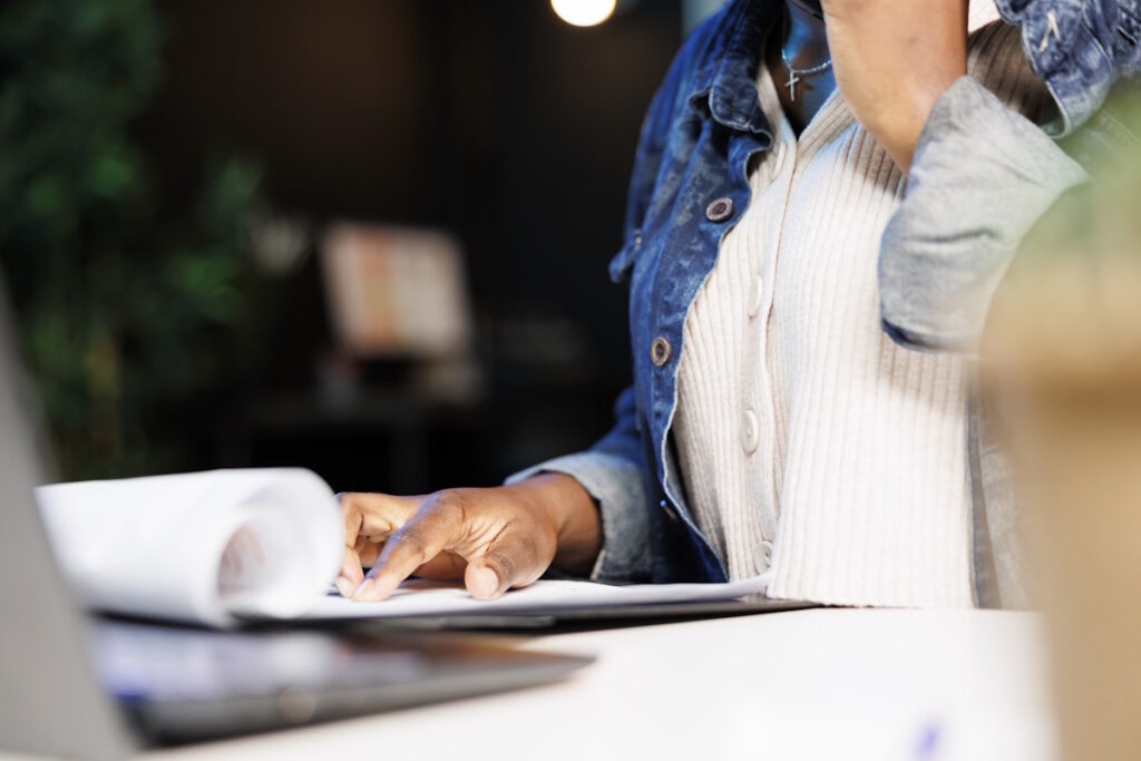 A business owner and accountant reviewing reports