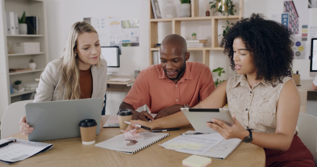 A small team handling bookkeeping or payroll tasks